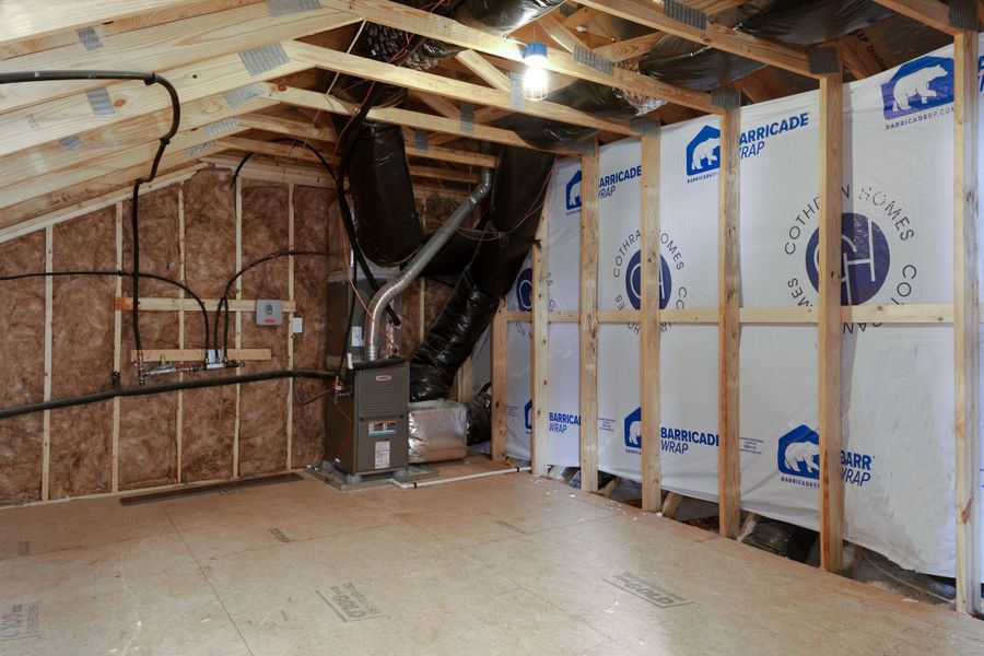 Representative furnished interior of a home built from the The Ivory by Cothran Homes in Holly Ridge, Greenville (Image 18).