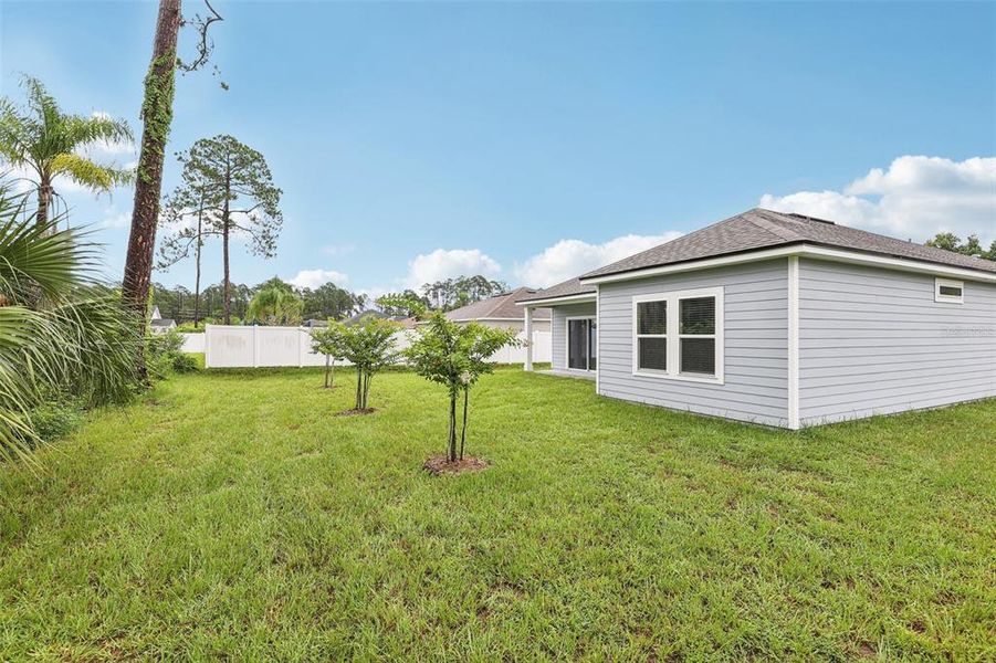 Exterior details and patio area of a home in , Palm Coast (Image 25).