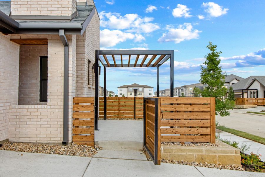 Exterior details and patio area of a home in Willow Grove Single-Family Homes, Melissa (Image 3). Exterior details and patio area of a home in Willow Grove Single-Family Homes, Melissa (Image 3).