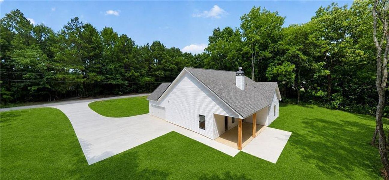 Front exterior of a new home in , Silver Creek, GA, highlighting curb appeal (Image 25). Front exterior of a new home in , Silver Creek, GA, highlighting curb appeal (Image 25).