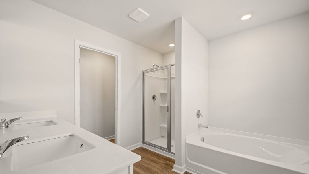 Representative furnished interior of a home built from the Somerset by D.R. Horton in Oakchase at Hampton, Hampton (Image 9).