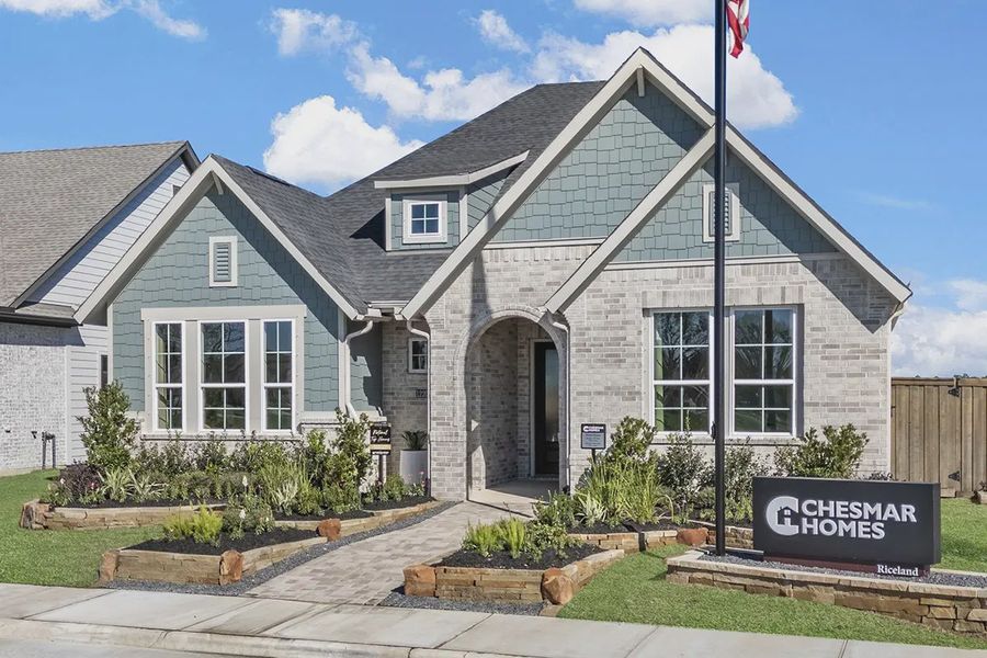 Representative exterior photo of a completed home built from the Nicklaus by Chesmar Homes in Riceland 50's, Mont Belvieu, TX (Image 2). Representative exterior photo of a completed home built from the Nicklaus by Chesmar Homes in Riceland 50's, Mont Belvieu, TX (Image 2).