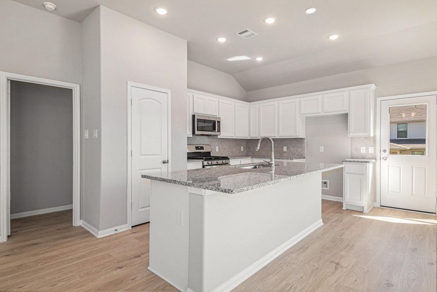 Furnished interior view inside a new home in Clear View Estates, Willis (Image 8).