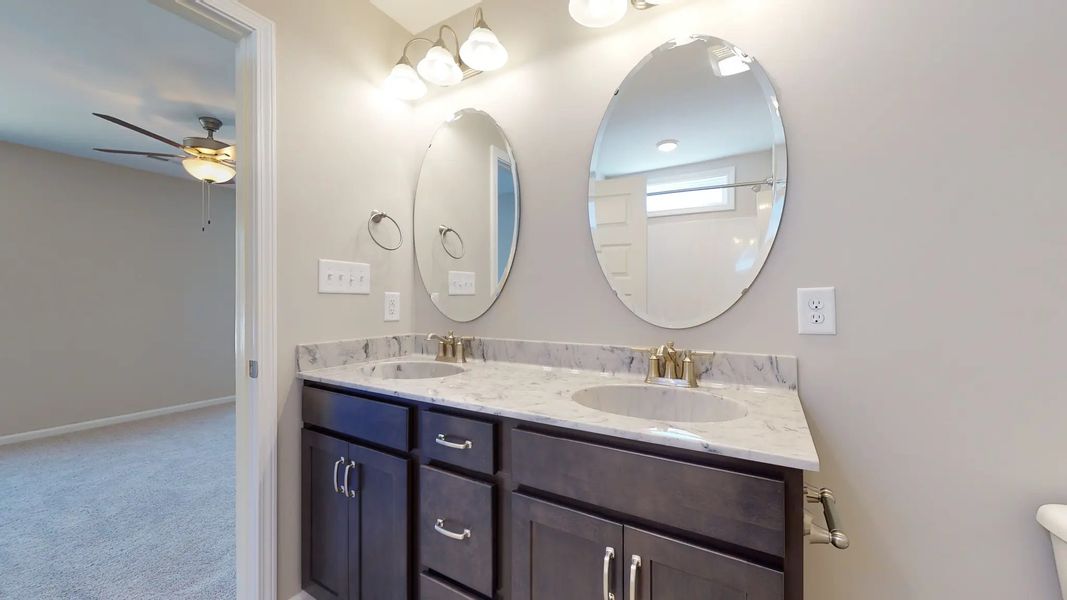 Representative furnished interior of a home built from the Corbin A by JC Jackson Homes,LLC in Heritage Pointe, Newport (Image 9).