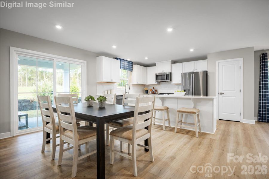 Together comes naturally here—kitchen and dinette designed for easy connection.