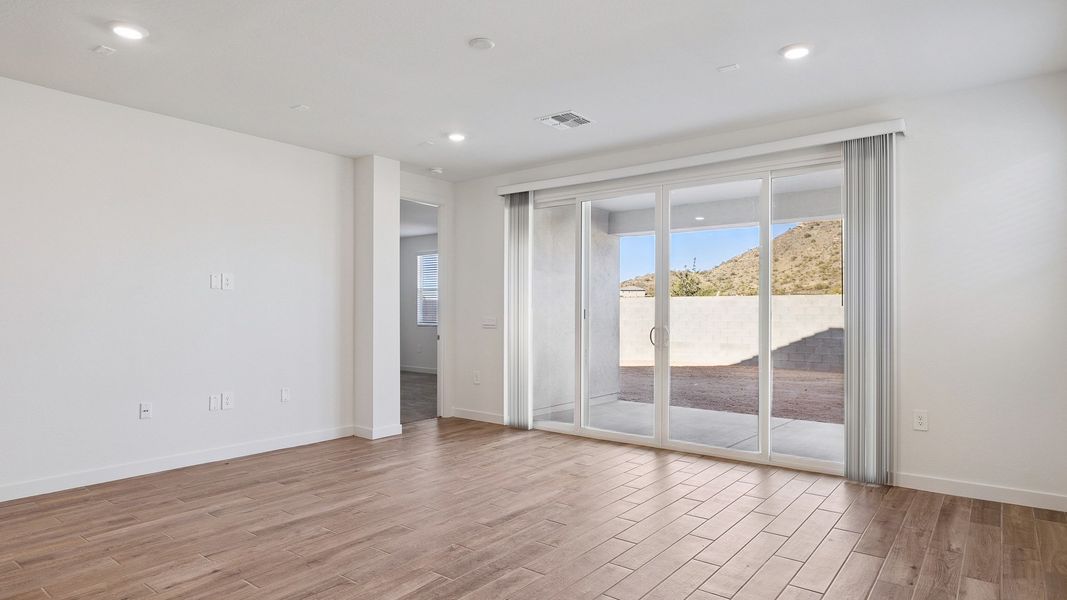 Representative unfurnished interior of a home built from the Hayden by D.R. Horton in The Ridge at Stone Butte, Phoenix (Image 31).