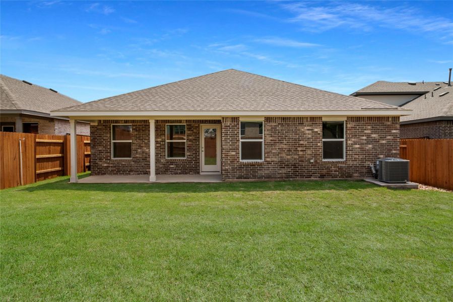 Exterior details and patio area of a home in Bar W Ranch, Leander (Image 3).