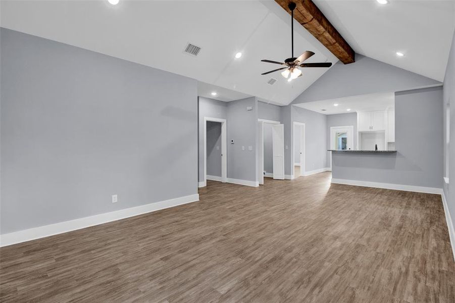 Unfurnished living room featuring recessed lighting, ceiling fan, and light wood finished floors