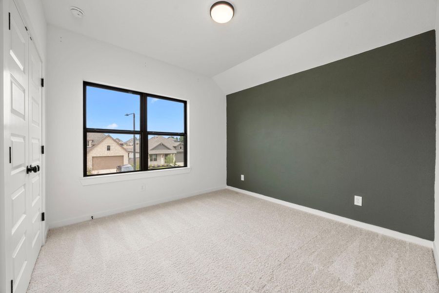 The second guest bedroom located upstairs.
