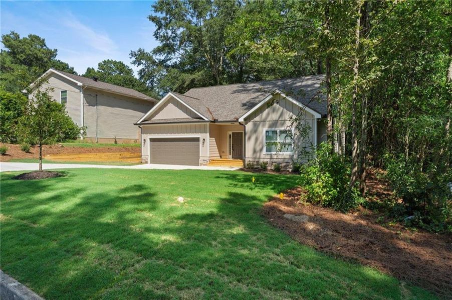 Front exterior of a new home in , Jonesboro, GA, highlighting curb appeal (Image 18).