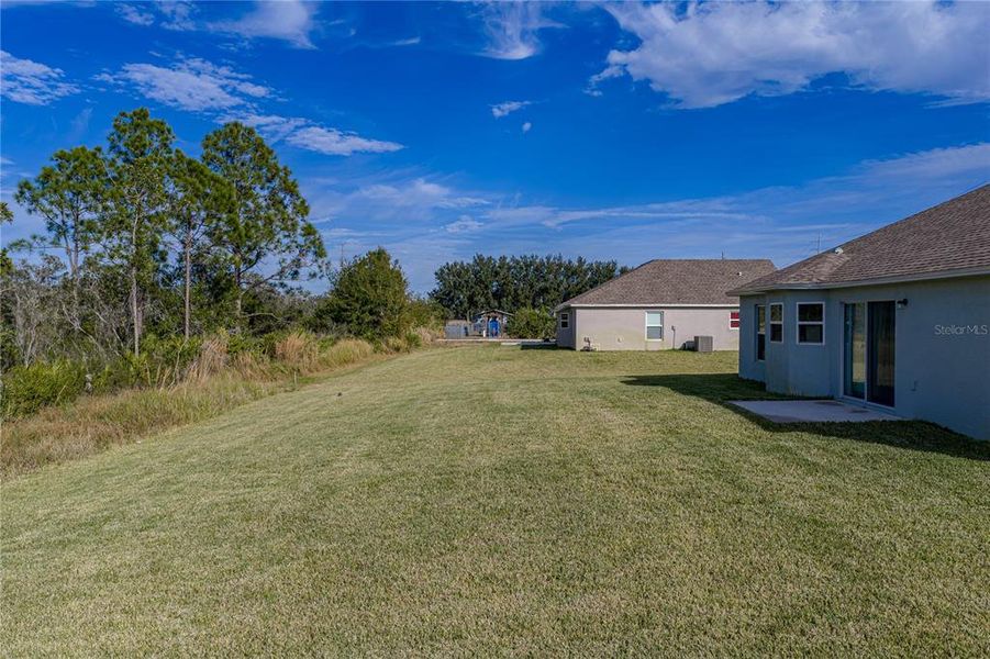 Exterior details and patio area of a home in , Sebring (Image 27).
