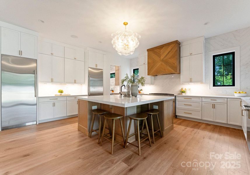 Large 78”+ island with bar seating/extra. 30” built in Monogram column fridge and 30” built in Monogram column freezer. Monogram dishwasher/drawer microwave storage and secondary prep sink. Large 78”+ island with bar seating/extra. 30” built in Monogram column fridge and 30” built in Monogram column freezer. Monogram dishwasher/drawer microwave storage and secondary prep sink.