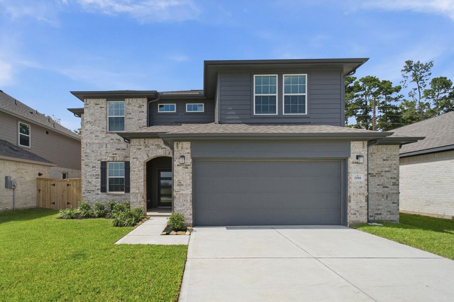 Front exterior of a new home in Sundance Cove, Crosby, TX, highlighting curb appeal (Image 1). Front exterior of a new home in Sundance Cove, Crosby, TX, highlighting curb appeal (Image 1).
