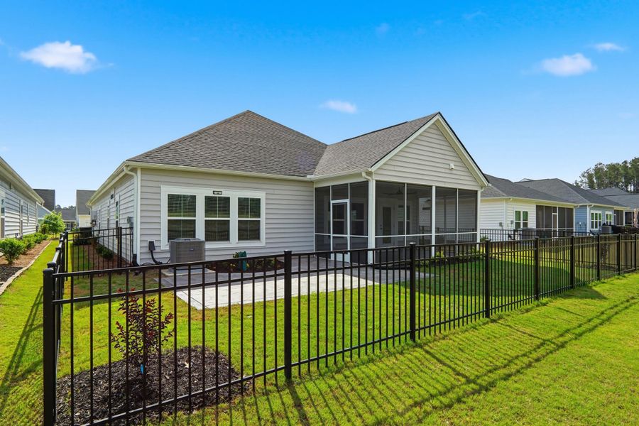 Exterior details and patio area of a home in Horizons at Summers Corner | 55+, Summerville (Image 31).