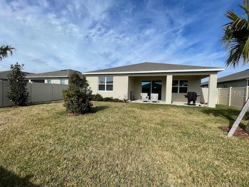 Exterior details and patio area of a home in Archers Mill, Ormond Beach (Image 21).