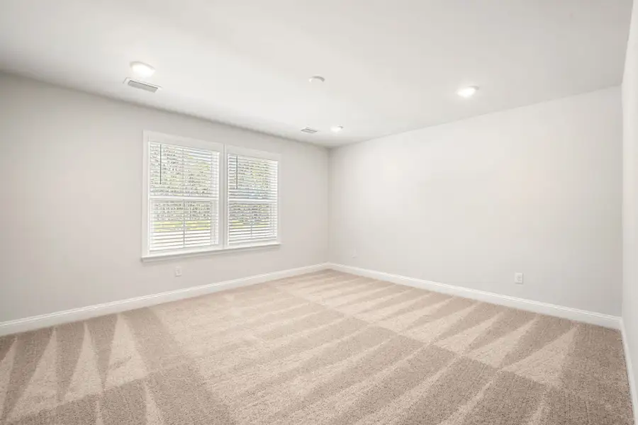 Spacious, unfurnished interior of a new home in Waterways, Richmond Hill (Image 22).
