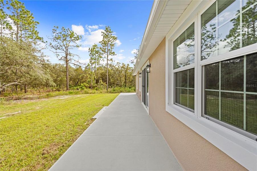 Exterior details and patio area of a home in , Weeki Wachee (Image 18).