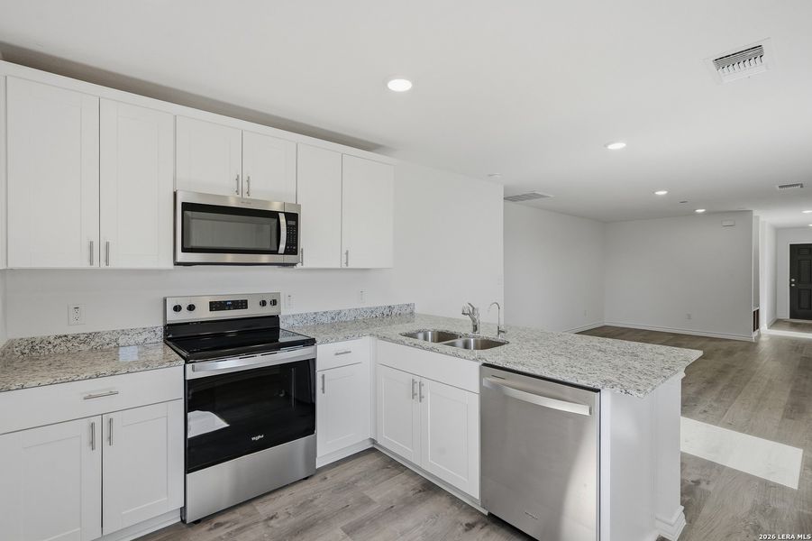 Furnished interior view inside a new home in Vista Real, Converse (Image 5).