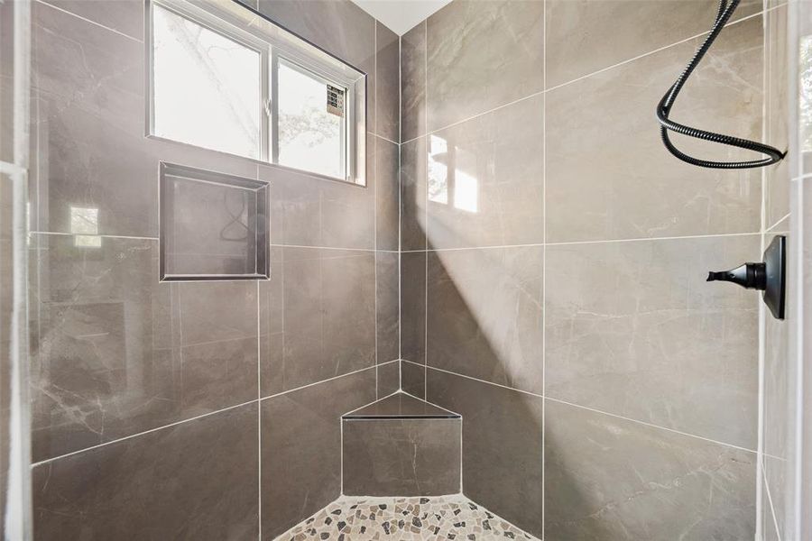 Bathroom featuring a shower stall