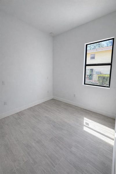 Spacious, unfurnished interior of a new home in , Port Charlotte (Image 10).
