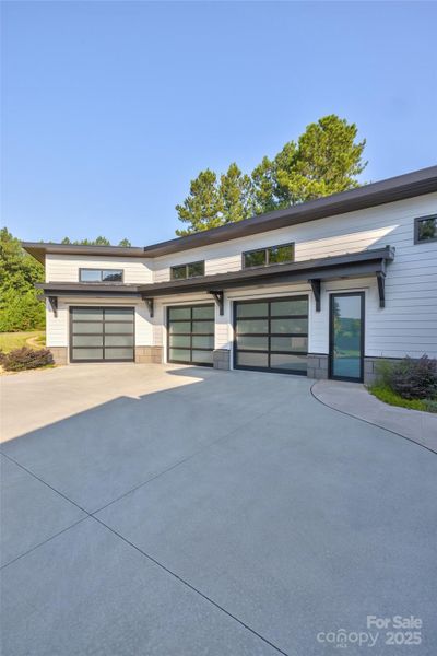 Front exterior of a new home in , Belmont, NC, highlighting curb appeal (Image 20).
