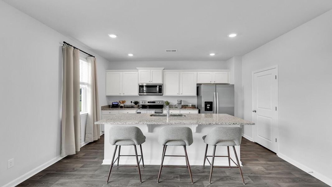Furnished interior view inside a new home in The Ranch, Holly Hill (Image 12).