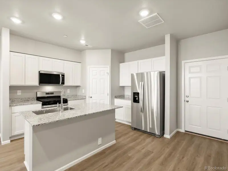 Furnished interior view inside a new home in Poudre Heights: The Meadow Collection, Windsor (Image 4). Furnished interior view inside a new home in Poudre Heights: The Meadow Collection, Windsor (Image 4).