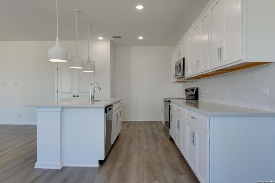 Furnished interior view inside a new home in Hennersby Hollow, San Antonio (Image 12).