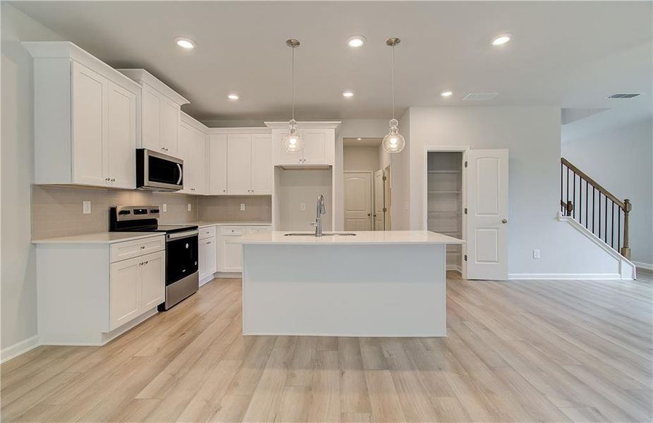 Furnished interior view inside a new home in Enclave at Evergreen, Fairburn (Image 7).