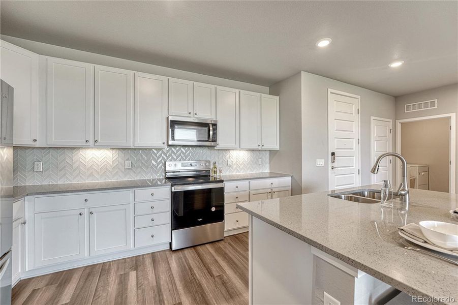 Furnished interior view inside a new home in The Trails at Westcreek, Parker (Image 14).