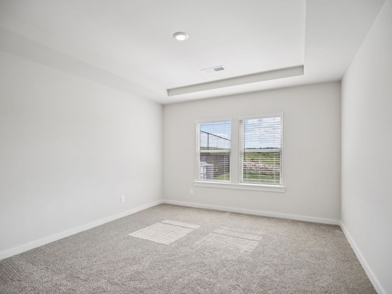 The primary suite offers a private retreat.