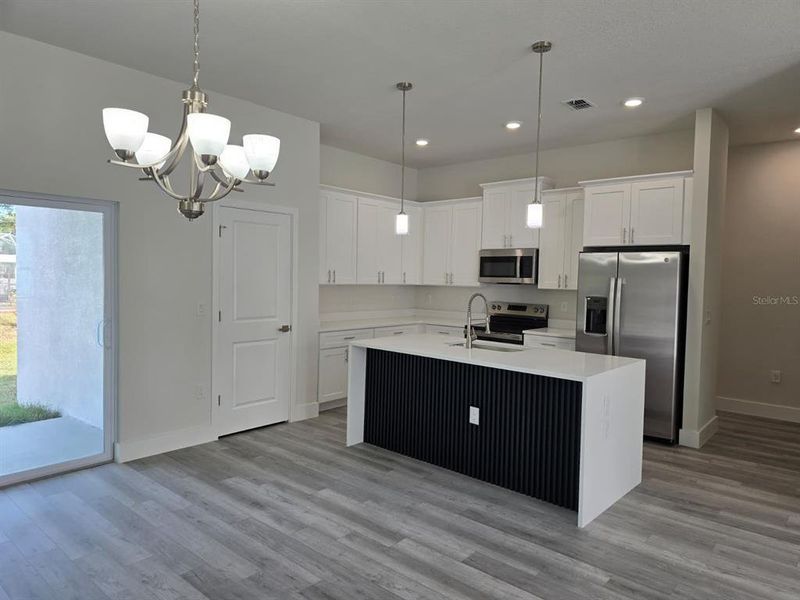 Furnished interior view inside a new home in , Port Charlotte (Image 8).