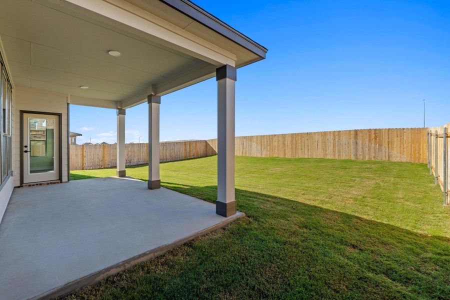 Exterior details and patio area of a home in Salerno - Classic Collection, Round Rock (Image 3).