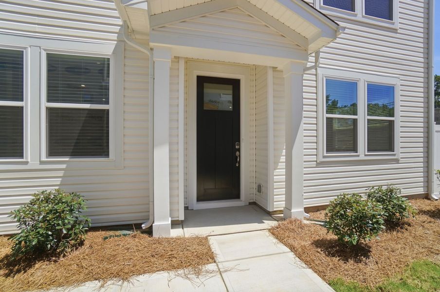 Exterior details and patio area of a home in Stonesummit at Reedy Creek, Charlotte (Image 3).