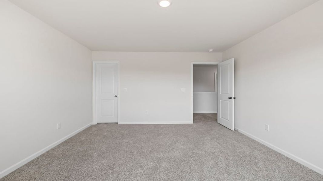 Spacious, unfurnished interior of a new home in Durbin Meadows Traditions, Fountain Inn (Image 26).