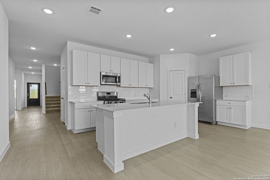 Furnished interior view inside a new home in Waterwheel: Coastline Collection, San Antonio (Image 5).