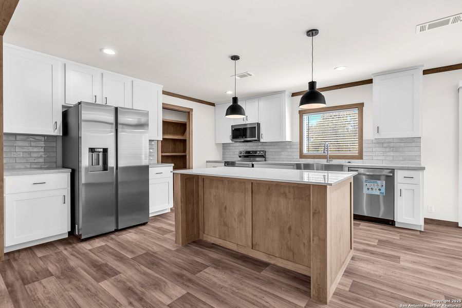 Furnished interior view inside a new home in , La Vernia (Image 11). Furnished interior view inside a new home in , La Vernia (Image 11).