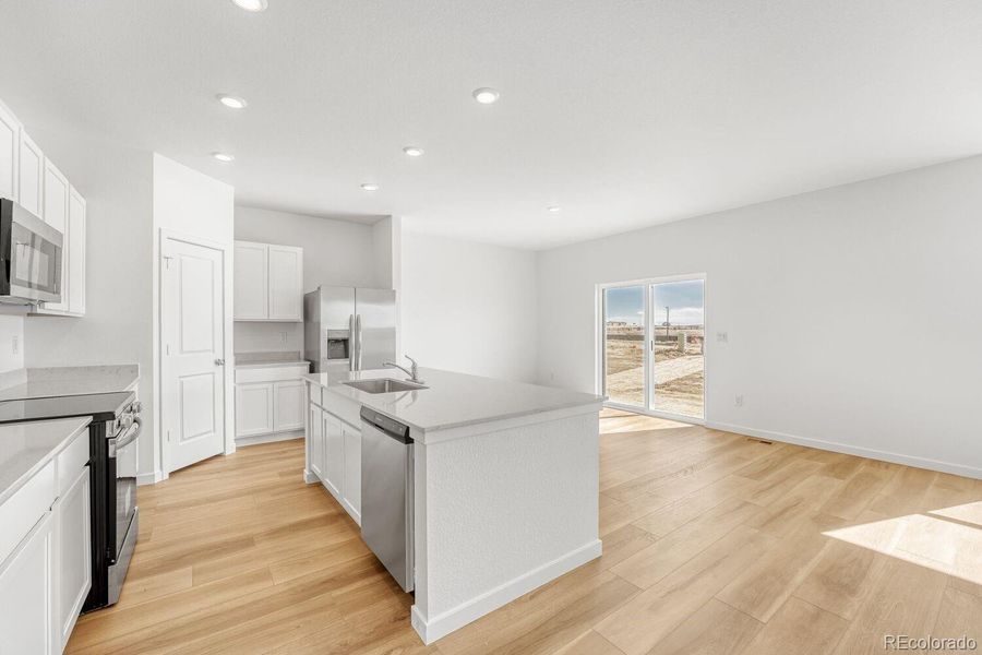 Furnished interior view inside a new home in Muegge Farms, Bennett (Image 5).