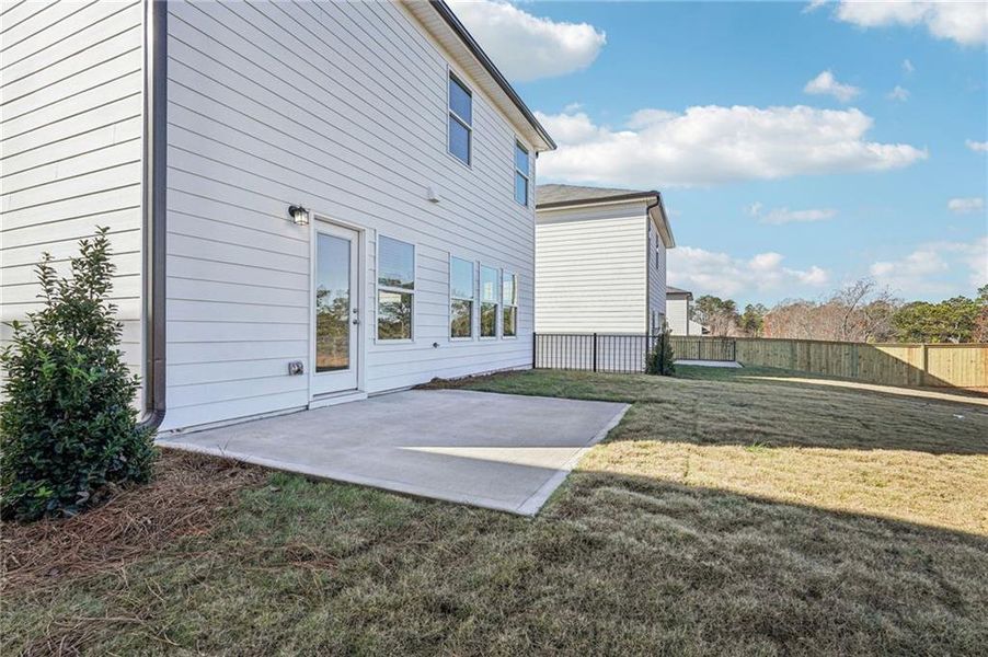 Exterior details and patio area of a home in Hawthorne Station, College Park (Image 31). Exterior details and patio area of a home in Hawthorne Station, College Park (Image 31).