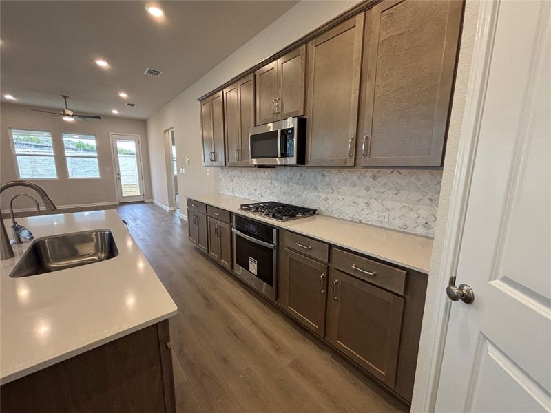 Furnished interior view inside a new home in Cannon Ranch 40s, Dripping Springs (Image 6).
