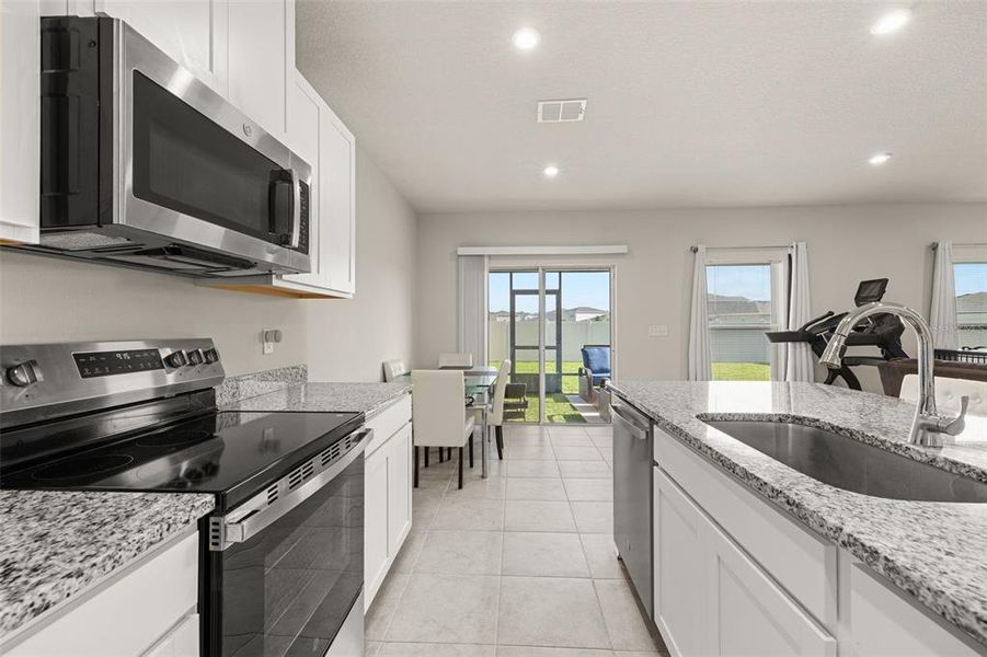 Furnished interior view inside a new home in , Sumterville (Image 42).