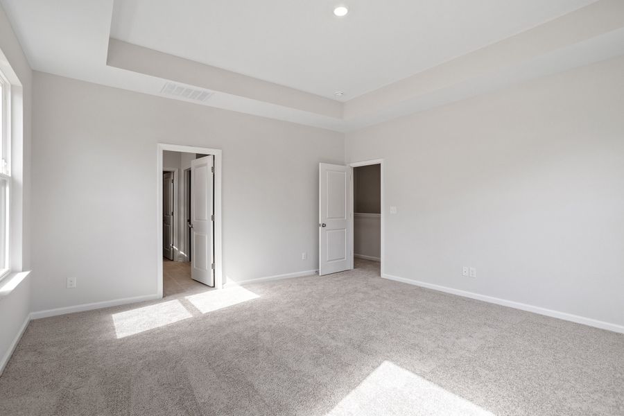Spacious, unfurnished interior of a new home in Sweetbrier, Durham (Image 22).