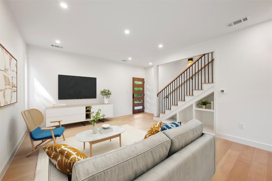 Clean lines and light wood flooring define this contemporary living space. Clean lines and light wood flooring define this contemporary living space.