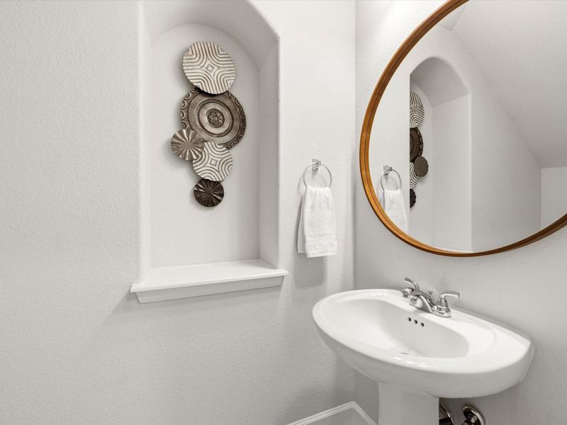 Powder room down with an art-nook!