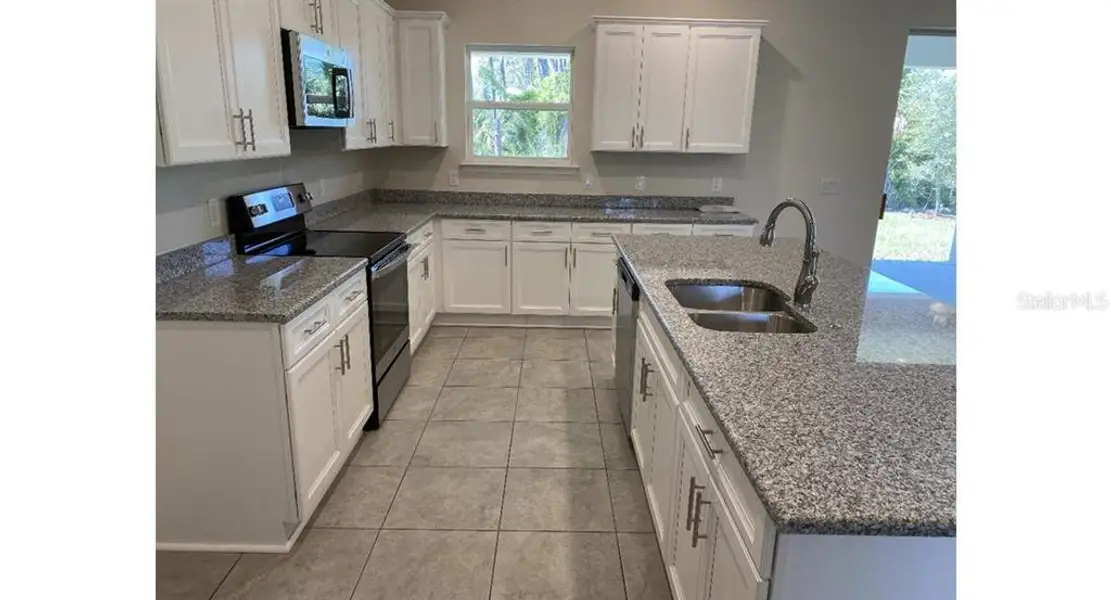 Furnished interior view inside a new home in , North Port (Image 4).