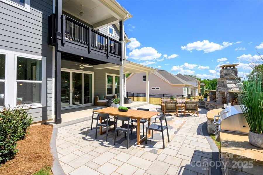 Exterior details and patio area of a home in North Creek Village, Huntersville (Image 20).