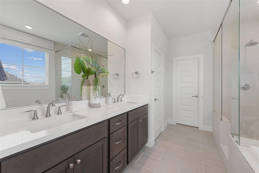 Furnished interior view inside a new home in The Corner At Buffalo Pointe, Houston (Image 9).