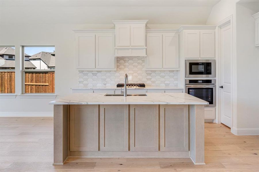 Furnished interior view inside a new home in Windsong Ranch Classic 61, Prosper (Image 7). Furnished interior view inside a new home in Windsong Ranch Classic 61, Prosper (Image 7).