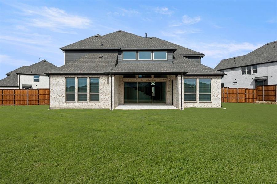 Exterior details and patio area of a home in Cambridge Estates - Harwood, Prosper (Image 23).