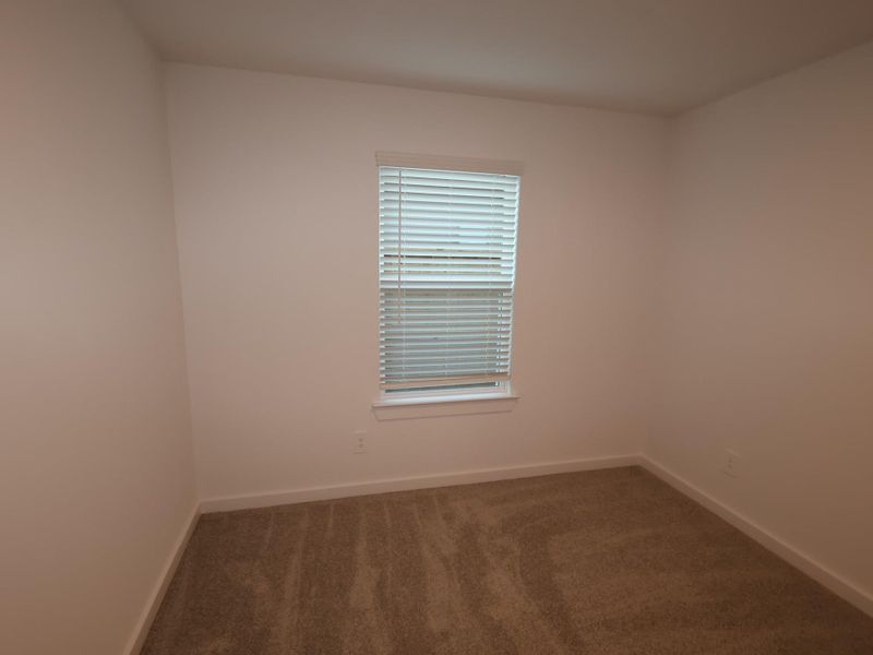 Spacious, unfurnished interior of a new home in Pinewood at Grand Texas, New Caney (Image 7).